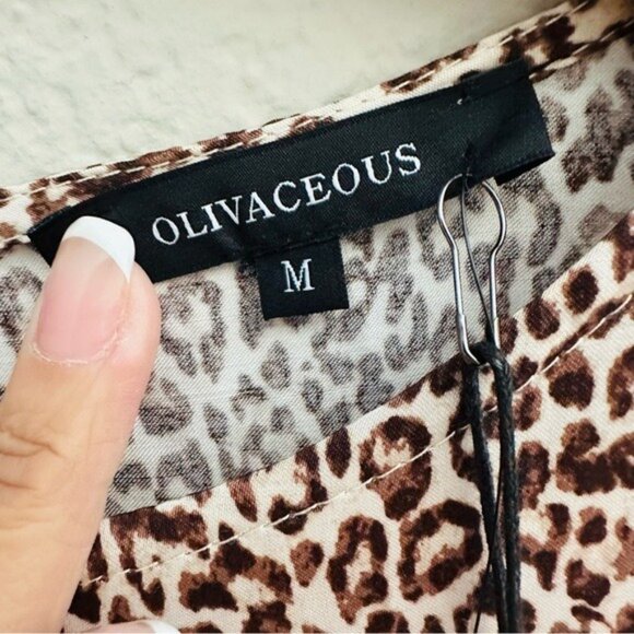 Olivaceous Tan and Black Sheath Dress with Bishop Sleeves Size Medium NWT - Picture 9 of 16